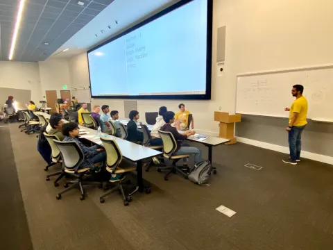 Abhishek Dhawan, a Ph.D. student in the School of Mathematics, leads a session on combinatorics during Georgia Tech High School Math Day. (Photo Renay San Miguel)